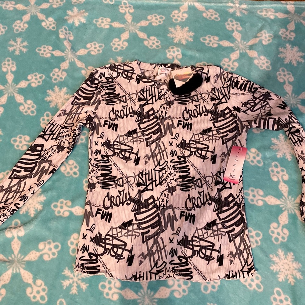 Long sleeve shirt with fuzzy scrunchy has black and white brand new